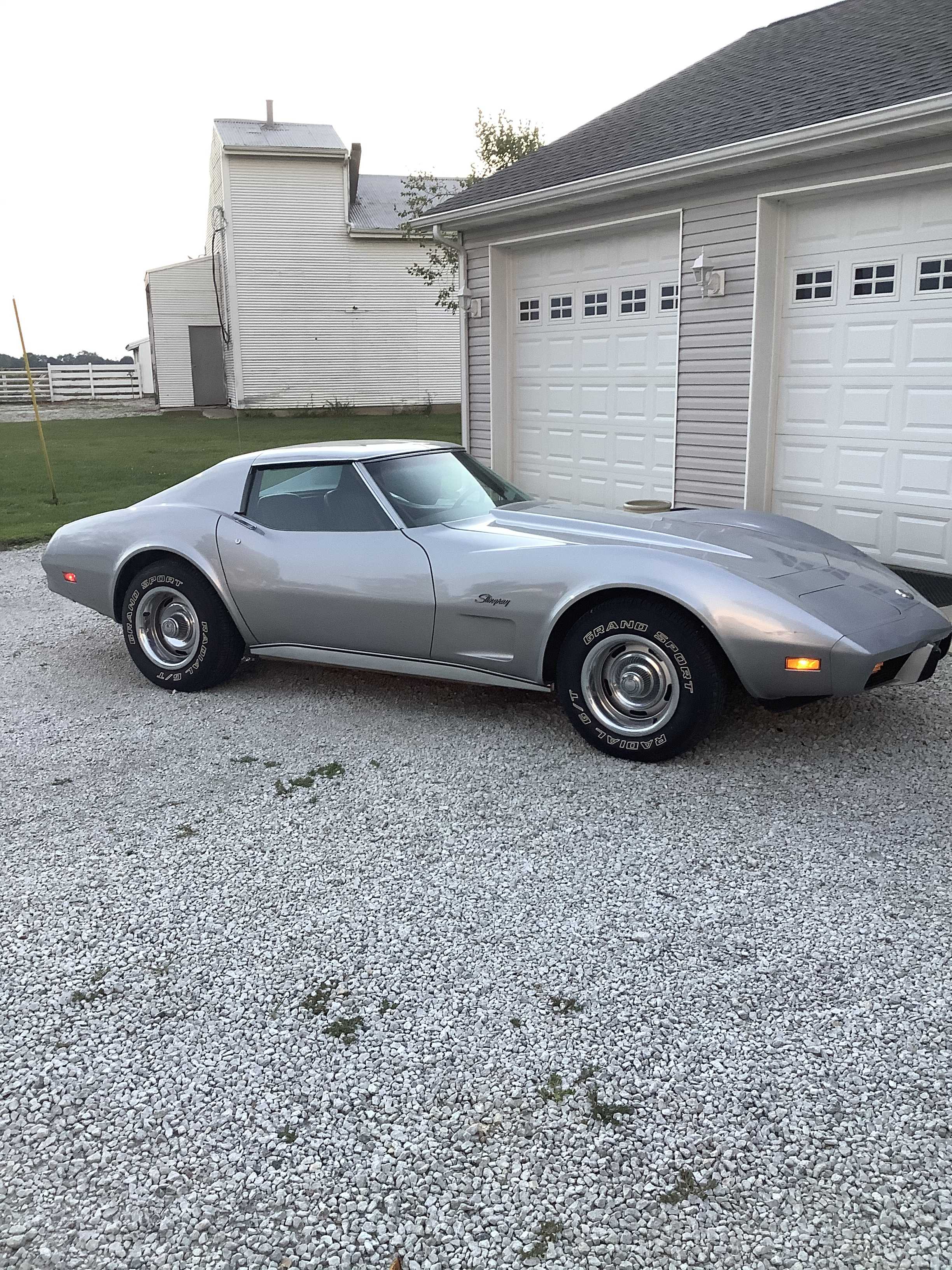 '76 CORVETTE, 18' FLATBED TRAILER, ANTIQUES, POWER TOOLS & MORE