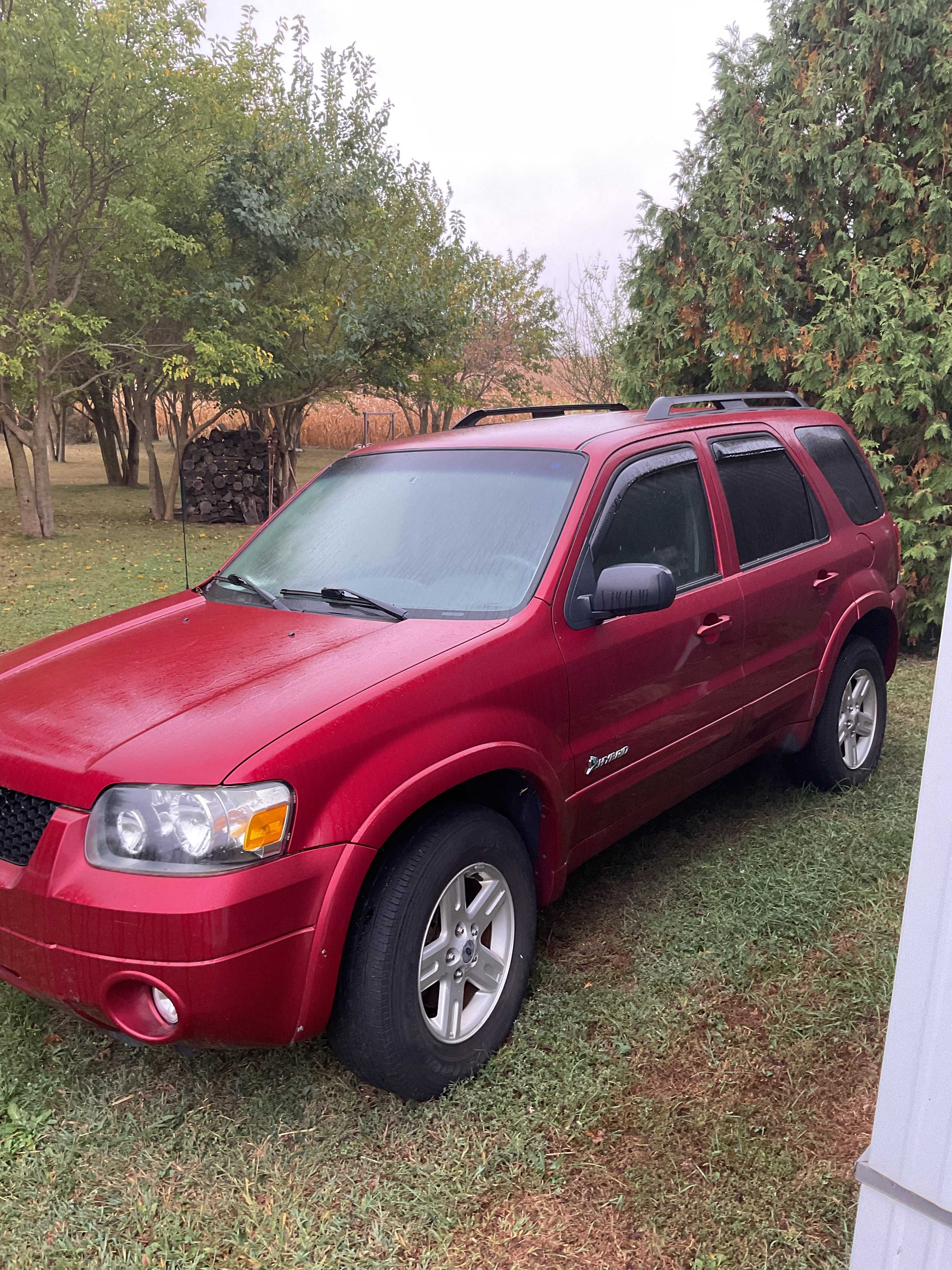 Auction teaser for '07 FORD ESCAPE, J/D MOWER, GUNS, AMMO, & MUCH MORE!